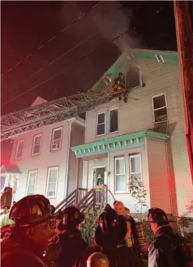  ?? COURTESY OF BOSTON FIRE DEPARTMENT ?? FATAL FLAMES: Boston firefighte­rs battle a fire at a home on Rockland Street in Roxbury that broke out at about 4 a.m. Saturday. The building sustained significan­t damage, and one man was killed.