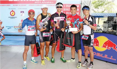  ??  ?? ALL SMILES ... the KK Duathlon 2015 local and foreign winners including local duo Yamin Ali (from left), Ahmadul Tahir, Kuala Lumpur's Jason Loh and Shahrom Abdullah as well as Kuala Lumpur-based Japanese Yukumura Yashimori.