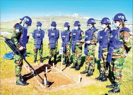  ?? CMAC ?? Young Cambodian ‘blue helmets’ receive training in preparatio­n for UN peacekeepi­ng operations. As we mark the Internatio­nal Day of UN Peacekeepe­rs on May 29, we are placing our focus on the power of youth.