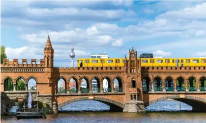  ?? Photograph: Nikada/Getty Images/iStockphot­o ?? A train on the Oberbaumbr­ücke Bridge in Berlin, Germany.