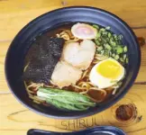  ??  ?? Soy-based shoyu ramen