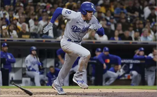  ?? ASHLEY LANDIS – THE ASSOCIATED PRESS ?? The Dodgers' Freddie Freeman runs out his two-run double during the third inning in Game 4of the NL Division Series against the Padres at Petco Park on Saturday night.