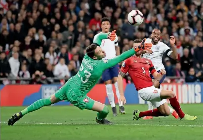  ?? Reuters ?? England’s Raheem Sterling scores a goal against Czech Republic during the Euro 2020 Qualifier. —