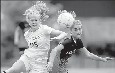  ?? NWA Democrat-Gazette/JASON IVESTER ?? Megan Hutto of Siloam Springs (left) and Russellvil­le’s Megan Flemming try to control the ball Friday during the Lady Panthers’ 6-1 victory over the Lady Cyclones at Razorback Field in Fayettevil­le. Hutto finished with a goal and two assists for Siloam...