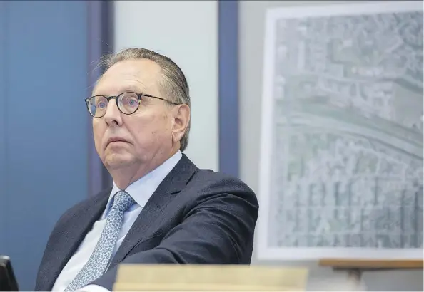  ?? SHAUGHN BUTTS ?? John Dill, managing partner at Cherokee Canada Inc. listens during the Environmen­tal Appeals Board hearing on the former Domtar lands on Monday. Cherokee Canada, the current landowner, is fighting Alberta Environmen­t’s “dig and dump” orders for contaminat­ed parts of the site.