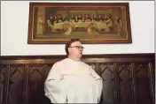  ?? ?? The Rev. Jordan Lenaghan speaks inside the priory at St. Mary Church in New Haven on Thursday.