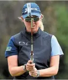 ?? — AFP ?? in fine fettle: South africa’s ashleigh buhai carded a 69 to move up the field.