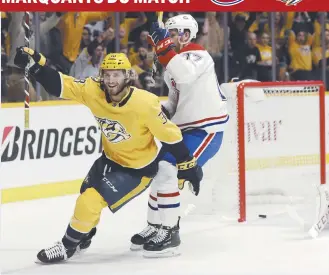  ??  ?? Ryan Hartman, des Predators de Nashville, célèbre après avoir déjoué Carey Price. Associated Press