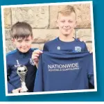  ??  ?? Raising the roof Sam Tennant and Kyle Cordner with their tracksuits sponsored by Nationwide Roofing and Scaffoldin­g