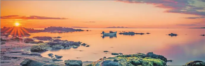  ?? All photograph­s by Raymond Hosie. ?? Kintyre sunset with Jura across the sea.