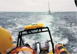  ?? PICTURE: NSRI RICHARDS BAY ?? RESCUE: The storm-damaged yacht Zazu being assisted into Port by NSRI Richards Bay.