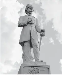  ?? Steve Gonzales / Houston Chronicle ?? The Richard Dowling statue near the entrance to Hermann Park.