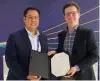  ?? CONTRIBUTE­D PHOTO ?? At the Cisco and PLDT Enterprise signing are (from left) Jojo Gendrano, senior vice president and head of Enterprise Business Group, PLDT and Smart, and Jonathan Davidson, executive vice president and general manager of Cisco Networking.