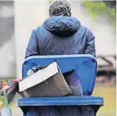  ?? ?? Collection changes Blue and brown bin collection­s won’t take place on Friday