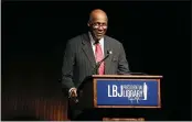  ?? JACK PLUNKETT — THE ASSOCIATED PRESS FILE ?? Civil rights activist Vernon Jordan introduces former President Bill Clinton during the Civil Rights Summit in Austin, Texas, in this file photo.