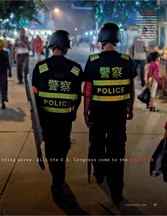  ??  ?? FEAST OF THE SACRIFICE* A Uyghur man stands in his doorway in Turpan, China, during the worldwide celebratio­n of the *Eid-al-Adha. Uyghurs are subject to restrictio­ns by China’s Communist Party during such religious celebratio­ns.