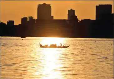  ?? HENG CHIVOAN ?? A sunset view across Cambodia’s Mekong River last year.