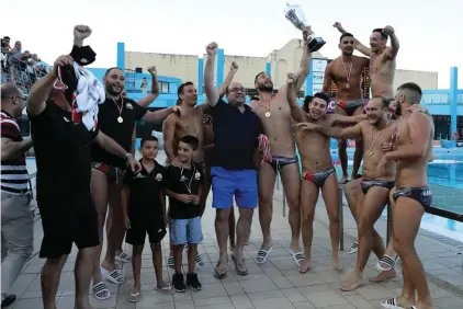  ??  ?? San Giljan TUM Invest celebrate winning the President's Cup after beating Neptunes Leo Vegas 11-10. Photos: Domenic Aquilina