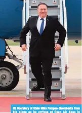  ?? — AFP ?? US Secretary of State Mike Pompeo disembarks from his plane as he arrives at Osan Air Base in Pyeongtaek yesterday.