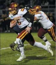  ?? RANDY MEYERS — FOR THE MORNING JOURNAL ?? Avon Lake quarterbac­k Jack Mikolich finds a huge hole in the Olmsted Fallls defense for a big gain during the first quarter on Oct. 19.