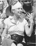  ?? THE ASSOCIATED PRESS ?? A woman talks with EMS workers after being hit in the head on the ninth fairway Friday at the RBC Heritage golf tournament.