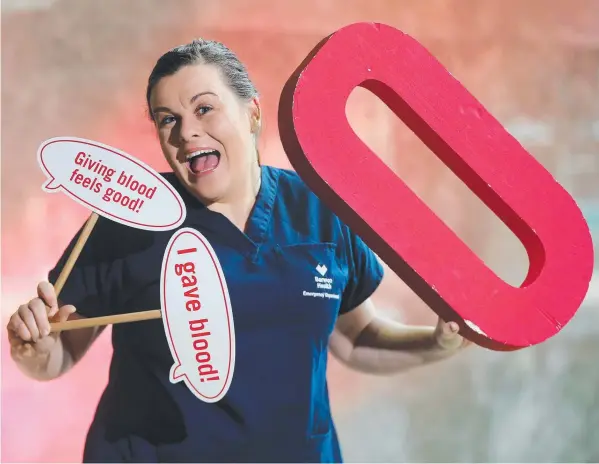  ?? Picture: PETER RISTEVSKI ?? RED ALERT: Barwon Health nurse Katelyn Baldwin is calling for blood donors, especially those with the O negative blood type.