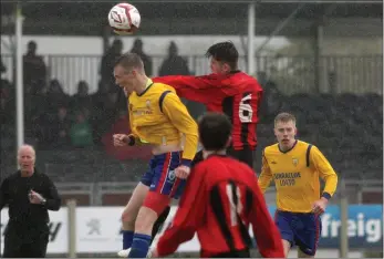  ??  ?? Seán Keane-Carroll of Curracloe United and Ethan Vickers of Gorey Rangers battle for the ball.