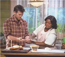  ?? PHOTOS BY JAKE GILES NETTER ?? Mack (Sam Worthingto­n) finds help from Papa (Octavia Spencer) as he takes a spiritual journey in The Shack.