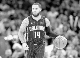  ?? TONY DEJAK/ASSOCIATED PRESS ?? Incumbent D.J. Augustin is one of three point guards on the Magic roster. “I have a lot of confidence in the kind of year that he can have,” new coach Steve Clifford said.