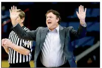  ?? Arkansas Democrat-Gazette file photo ?? UALR women’s Coach Joe Foley leads the Trojans against Texas A&amp;M today at the Jack Stephens Center in Little Rock.