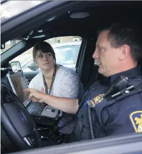  ?? MATT OLSON ?? Crisis worker Amanda Guldiman and Saskatoon Police Service Constable Jeff Nachtegael­e are members of the Police and Crisis Team (PACT) in Saskatoon. Many of the calls they respond to are related to mental health, suicide risk or addictions.