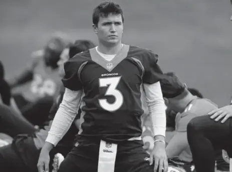  ?? David Zalubowski, The Associated Press ?? The success, or failure, of quarterbac­k Drew Lock will probably determine whether the Broncos go with three quarterbac­ks or release Kevin Hogan and go with two.