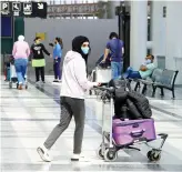  ?? Reuters ?? Lebanese expatriate­s, already wary over the coronaviru­s disease pandemic, are skeptical about returning home to go on holiday, or of sending money to their families.