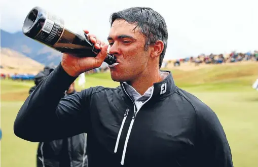  ??  ?? Dimitrios Papadatos celebrates winning his first profession­al title, the New Zealand Open in Arrowtown yesterday.