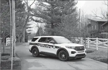  ?? MICHAEL CONROY/AP PHOTO ?? Police secure the entrance to the neighborho­od of former Vice President Mike Pence’s home on Friday in Carmel, Ind. The FBI is searching Pence’s home as part of a classified records probe.