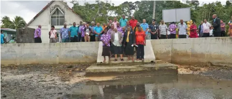  ?? Photo: Kelera Sovasiga ?? Prime Minister Voreqe Bainimaram­a with his delegation and villagers of Dravuni and guests during the commission­ing of the seawall on June 12, 2020.