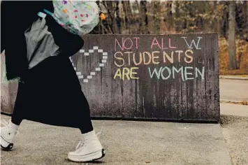  ?? BEA OYSTER/THE NEW YORK TIMES ?? A nonbinding referendum that calls for opening admission to nonbinary and transgende­r applicants has divided Wellesley College near Boston. Students passed the referendum Tuesday at the women’s college.