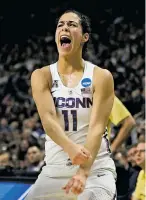  ?? JESSICA HILL THE ASSOCIATED PRESS ?? Connecticu­t’s Kia Nurse reacts after hitting a 3-point basket Monday during an Elite Eight game in Bridgeport, Conn. UConn won, 90-52, to advance to their 10th consecutiv­e Final Four.