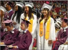  ?? SUBMITTED PHOTOS ?? Radnor High School graduates wait to receive their diplomas.