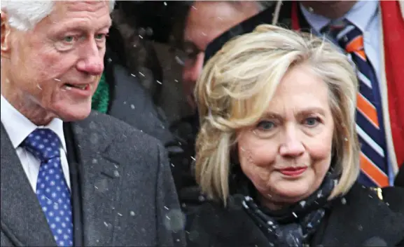  ??  ?? Under pressure: A new book has rocked the Clintons