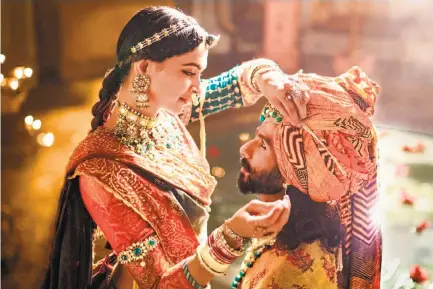  ?? Viacom18 Motion Pictures ?? Deepika Padukone as Queen Padmavati and Shahid Kapoor as Maharawal Ratan Singh in the movie “Padmaavat.”