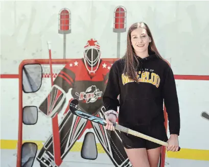  ?? DAVID BEBEE WATERLOO REGION RECORD ?? Incoming University of Waterloo student and athlete Sarah Dunbar, a field hockey star at Bluevale Collegiate, at her family home. She was disappoint­ed, but not overly surprised, university sports had been cancelled for the fall.