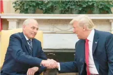  ?? AFP ?? President Donald Trump with newly sworn-in White House Chief of Staff John Kelly at the White House in Washington, DC, on Monday. —