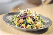  ?? CONTRIBUTE­D BY MIA YAKEL ?? Though Molly B’s is at a stadium, its menu goes beyond standard fare with items such as the Power Bowl salad with roasted butternut squash, beets, arugula, kale, nuts and seeds, quinoa, and hickory-sorghum vinaigrett­e.