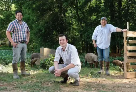  ?? SARA D. DAVIS/PICNIC RESTAURANT ?? Green Button Farm owner Ryan Butler, left, chef Ben Adams and chef Wyatt Dickson partnered to create Picnic.