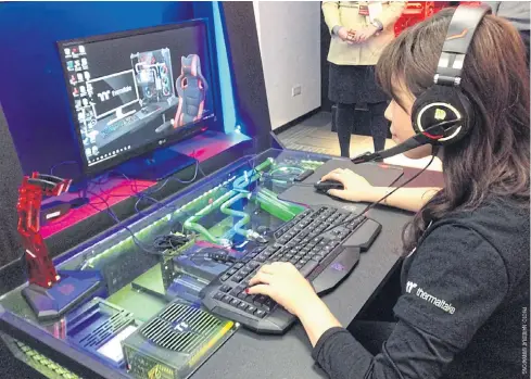  ??  ?? The Taiwanese PC company Thermaltak­e is finding a growing niche market for its custiomisa­ble gaming stations.