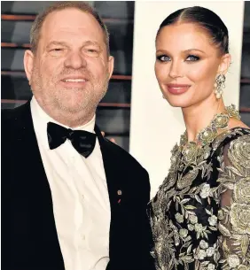  ??  ?? > Harvey Weinstein with wife Georgina Chapman, who has reportedly left him