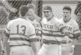  ?? Juan DeLeon ?? Deer Park Chase Keng, center, is batting .437 with 52 RBIs and shortstop Josiah Ortiz, left, is hitting .333 for the Deer, who will face Southlake Carroll in the Class 6A semifinals today in Round Rock.