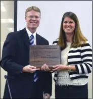  ??  ?? Nebo School District Superinten­dent Rick Nielsen accepts the Master Boards Award for 2014.