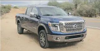  ?? LESLEY WIMBUSH/DRIVING ?? The 2016 Titan XD features a longer nose to accommodat­e its big Cummins diesel.